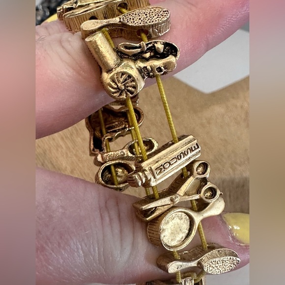 ADORABLE gold coloured hair product themed costume jewelry bracelet, stretchy - Picture 4 of 11